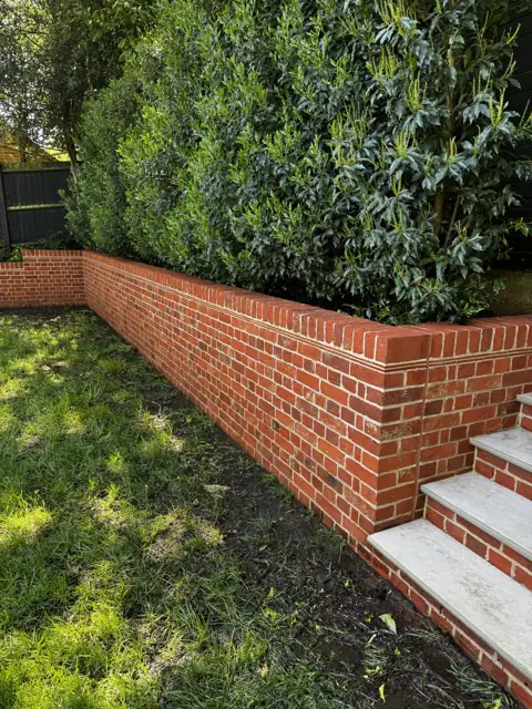 Brick retaining wall clean in Harpenden, after cleaning by Renaco