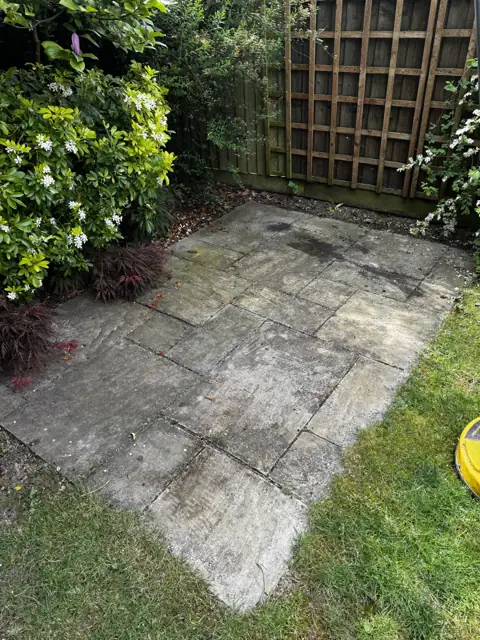 Indian sandstone patio clean in Wheathampstead, before cleaning by Renaco