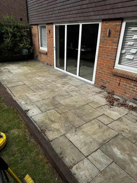 Indian sandstone patio clean in Wheathampstead, before cleaning by Renaco